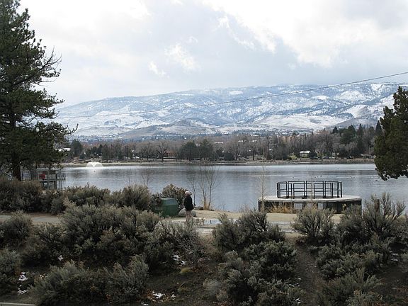 View of the lake and mountains from the living room and primary room suite