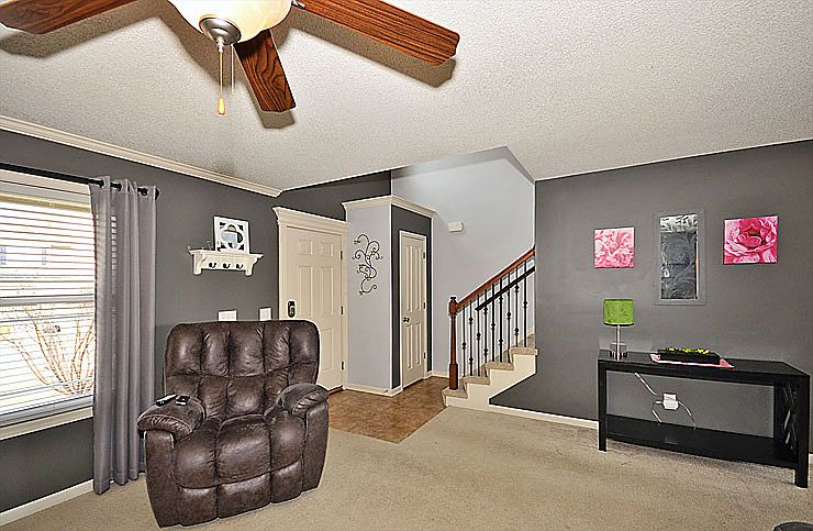 TILED ENTRY IN FOYER.