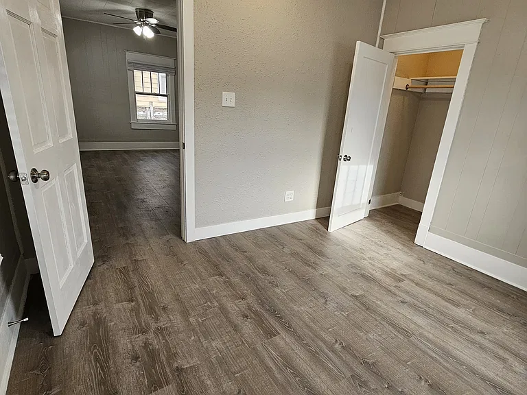 Front Bedroom 11' 6" x 10' with ceiling fan.