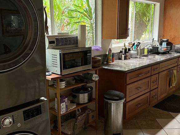 Kitchenette; as you walk in entrance Washer and Dryer are right on your left.