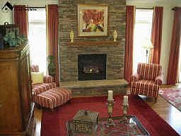Spacious great room with stone fireplace