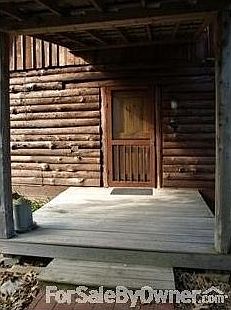 Main entry
						:
						Note the solid wood handmade entry door!