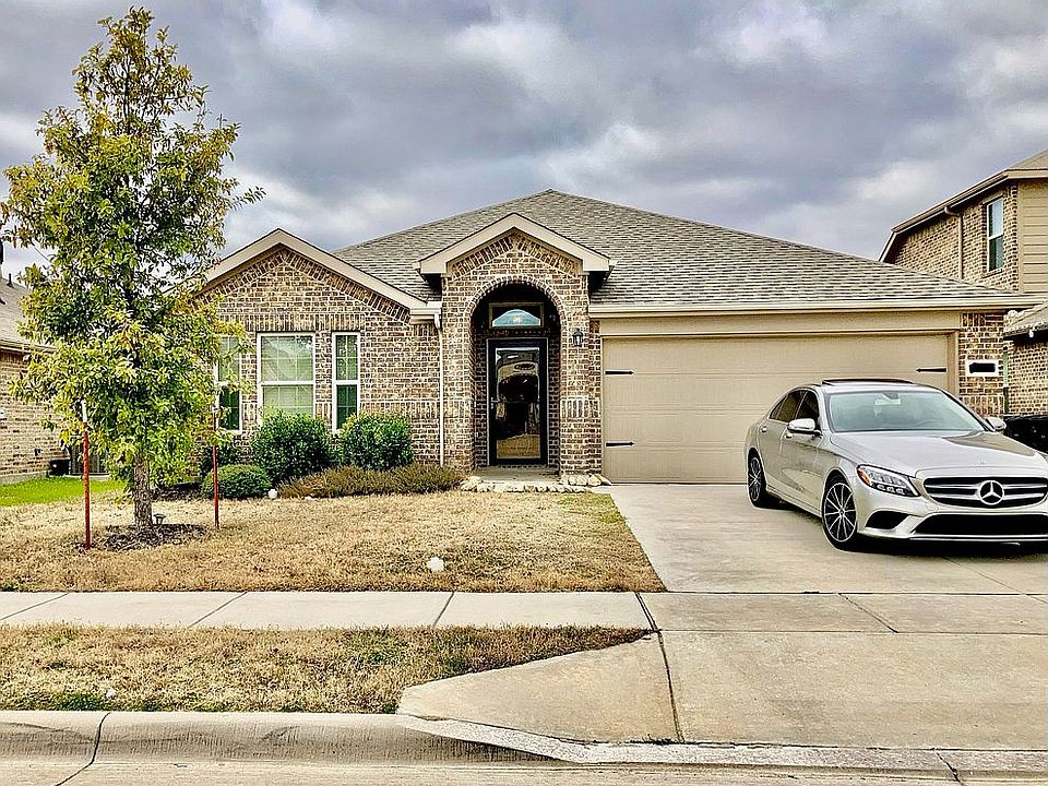 Front. 2 car garage.