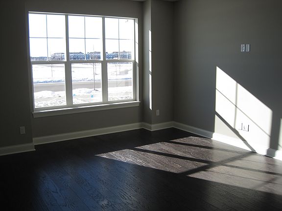 Living area with big windows facing the Central Park