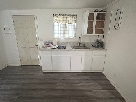 small kitchen with set of cabinets