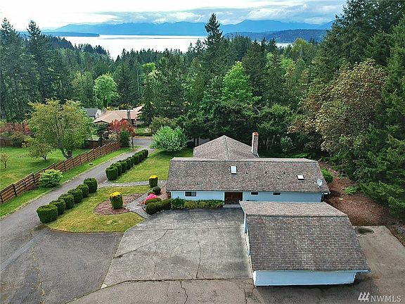  This home offers plenty of parking in front, side, and back of 2 car garage. Location is near Seabeck State Park and beaches!