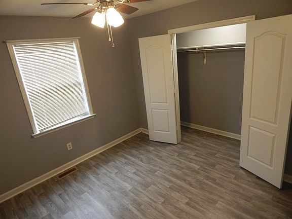 The first bedroom is to the left of the living room as you enter the apartment. This bedroom is on the front of the building. The closet is large, as it is the full length of the room.