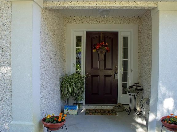 Enter the front door of this lovely home to experience the desirable split bedroom layout.
