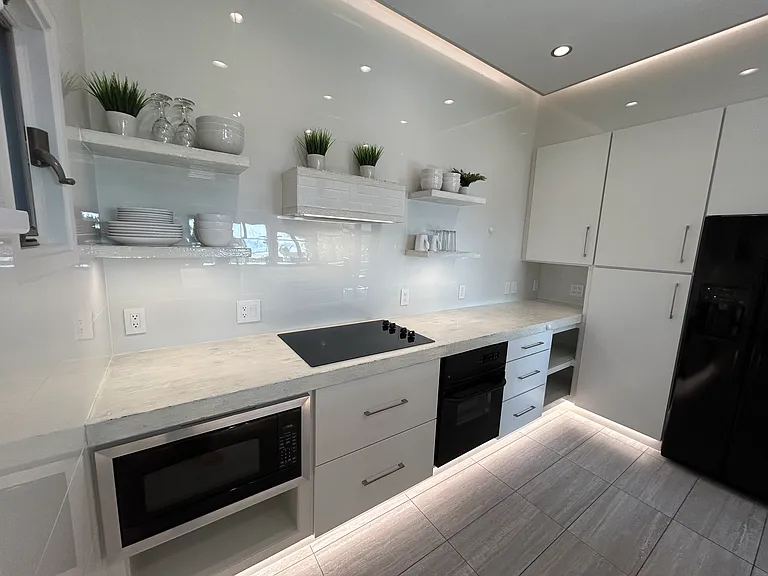 Kitchen microwave, cook top, oven