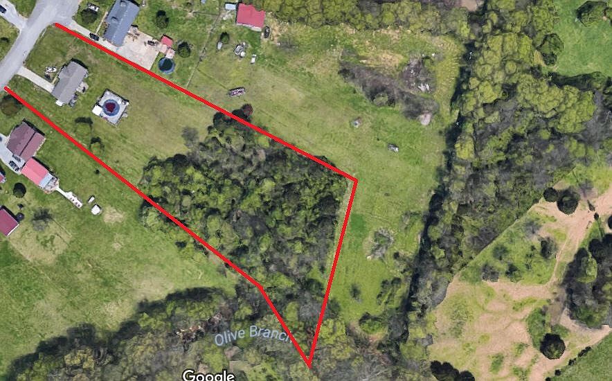 2.1 acres, part woods, creek