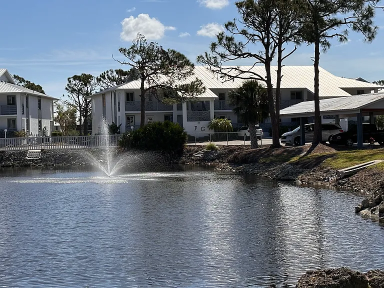 Find your zen by the water. __ There is something so soothing about the sound of the fountain at the clubhouse pond. It's the perfect backdrop for a morning stroll or a quiet moment to plan your day's adventures. Just one of the many tranquil sights here.