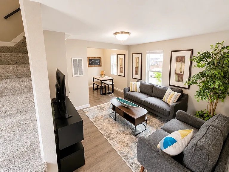 Cozy living room and dining nook off of the kitchen