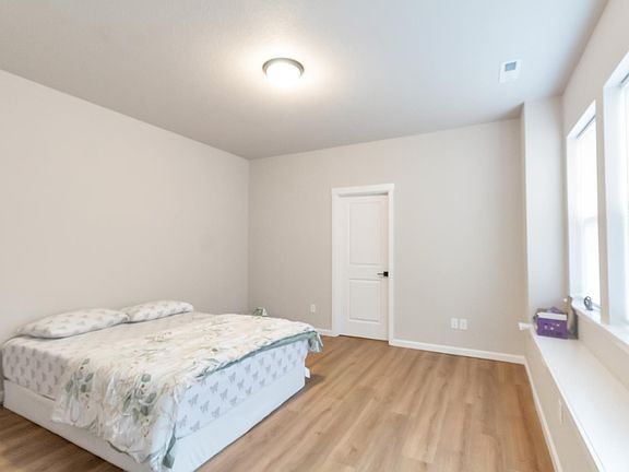 Bedroom with attached bath and bay window. (furniture not included)