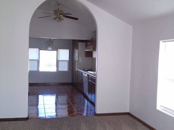 View from front door - living room, archway, kitchen, dining