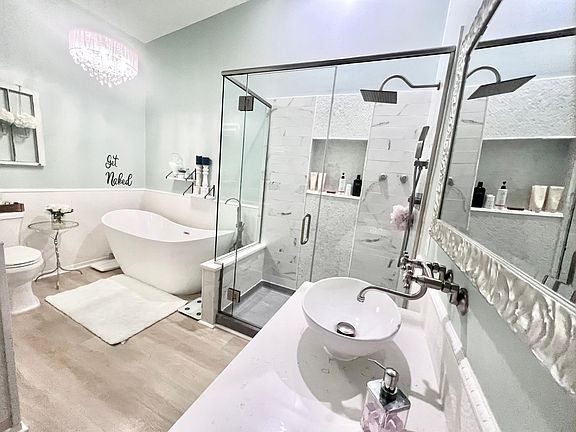 Master bathroom with large soaking tub and walk-in shower
