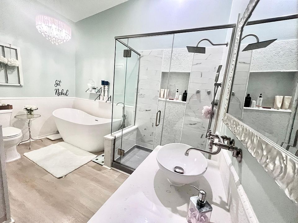 Master bathroom with large soaking tub and walk-in shower