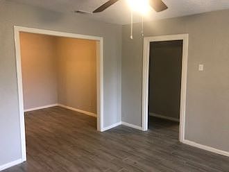 Living and dining/den space, bedrooms and bathrooms are down the hall on the right