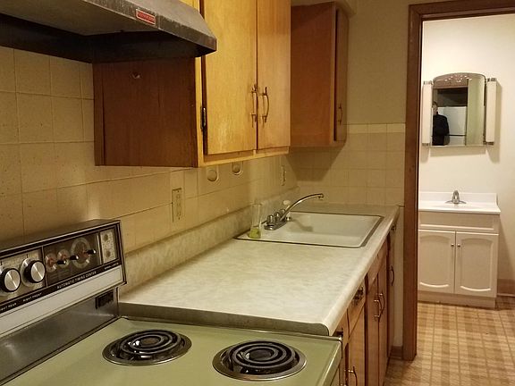 kitchen looking into bathroom
