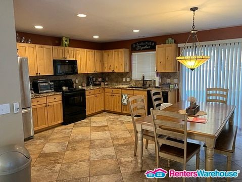 4th image of 6698 Greenfield Ln