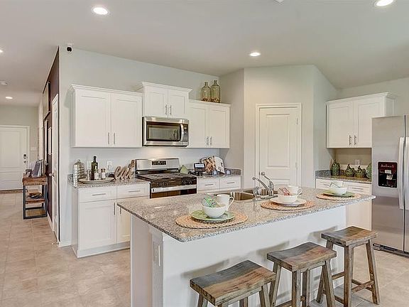 Kitchen - All Home and community information, including pricing, included features, terms, availability and amenities, are subject to change at any time without notice or obligation. All Drawings, pictures, photographs, video, square footages, floor plans, elevations, features, colors and sizes are approximate for illustration purposes only and will vary from the homes as built.