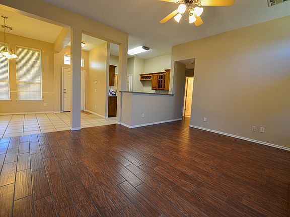 Open concept kitchen, living and dining areas