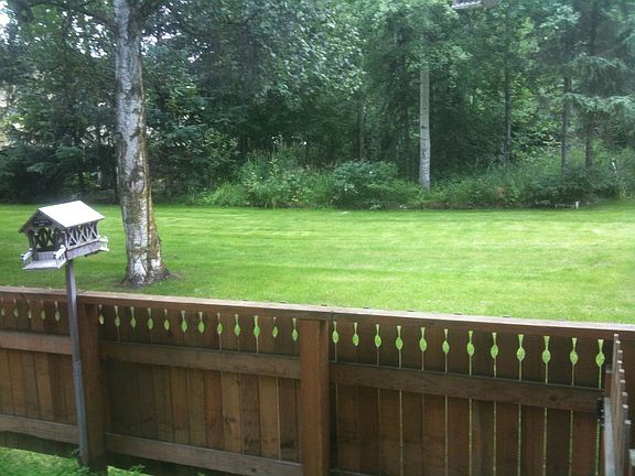 Out the back door to the secluded yard.