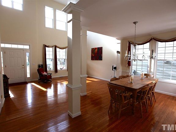 Beautiful new hardwood floors and cathedral ceiling with lots of light create a striking setting.