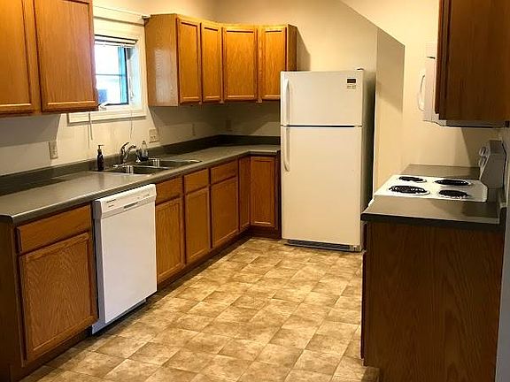 Kitchen includes dishwasher, electric stove and refridgerator/freezer. Dining room/Kitchen 9.5 feet by 12 feet 6 inches.