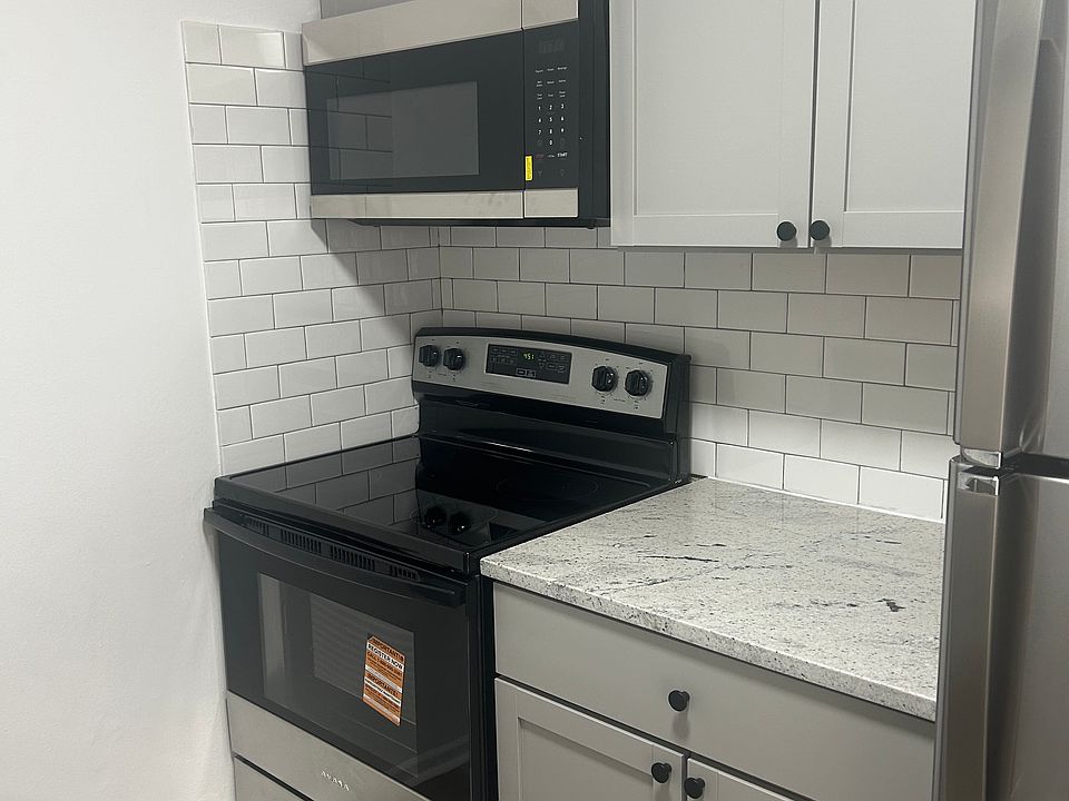Kitchen with all new cabinets, appliances, flooring, and backsplash.