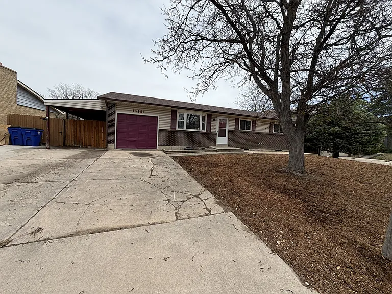 Front of house - garage and carport