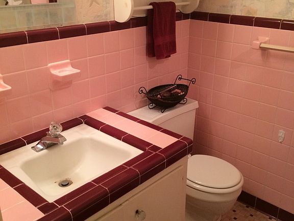 Pink tile guest bath