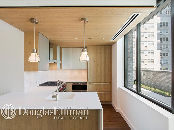 2nd image of 211 E 13th St #Penthouse 1