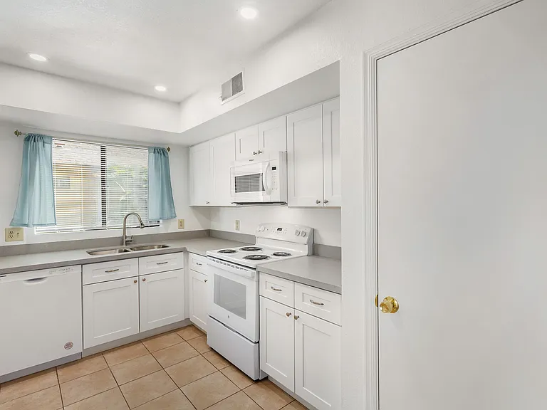 Remodeled Kitchen. NEW appliances, cabinets, paint, and lighting. Pantry for storage.