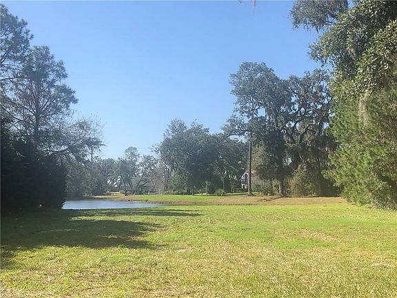 View from the left side of the lot.  Lot is partially cleared.