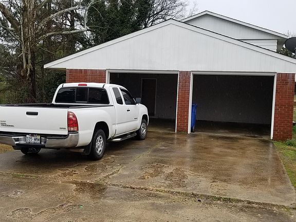The double car garage with easy entry with your groceries & kids.