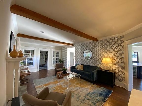 Living room and entrance to office/sitting area to left