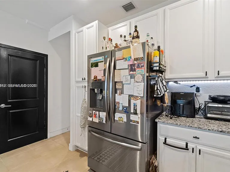 10934 SW 235th St — Photo 7