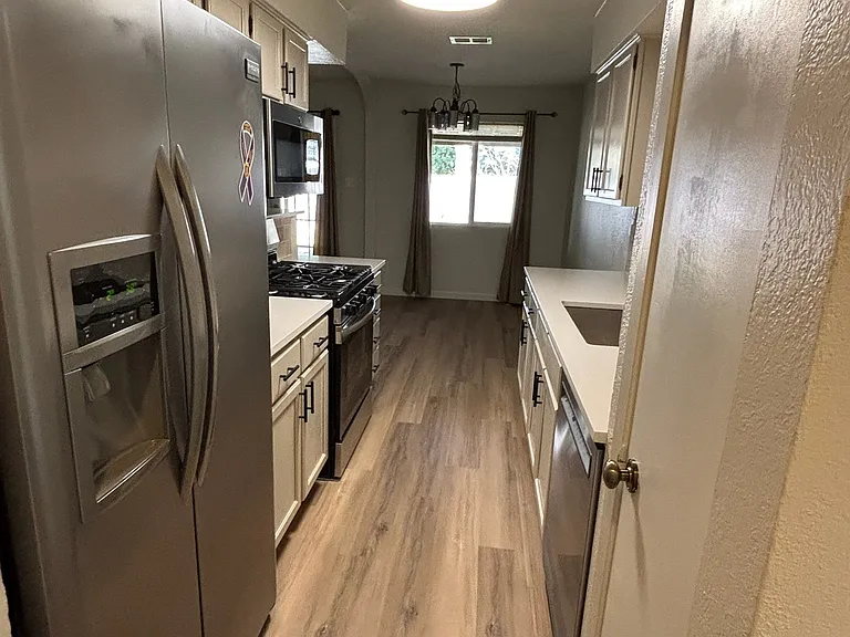 Kitchen from laundry - mud room