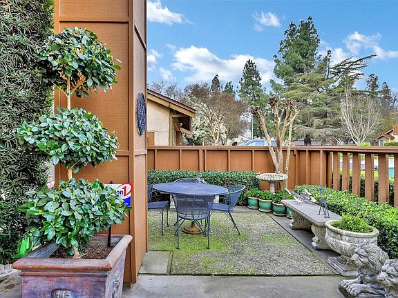 Enjoy relaxing or welcoming guests in the front courtyard...