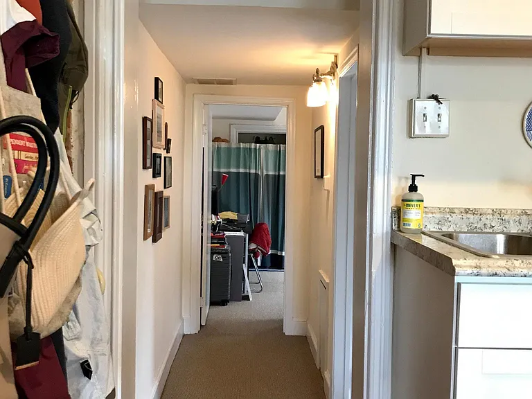 Hallway. Bathroom on right.