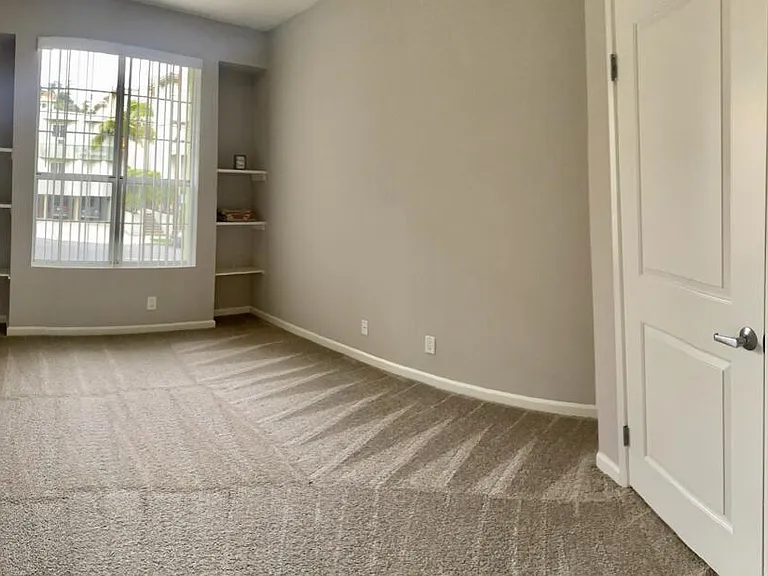 Apartments in Hollywood, CA - The Summit Livingroom with built-in bookcases