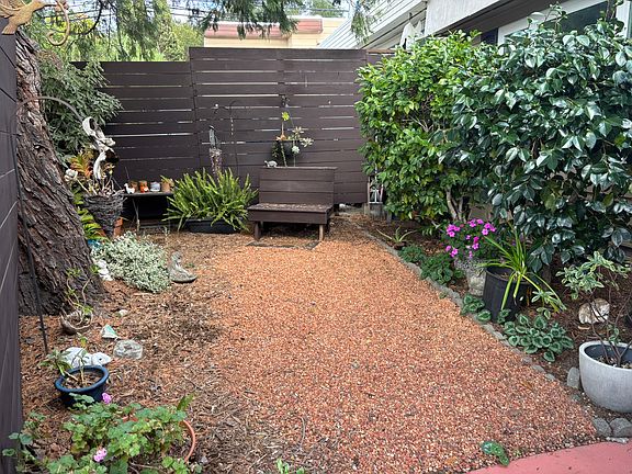 Front yard, behind the partial fence