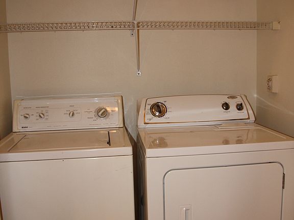 Laundry with Storage Shelves