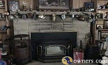 Fireplace w/ "Quadrafire" wood burning insert