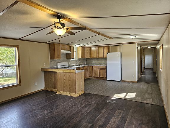 Living room leading in the kitchen/dining room.