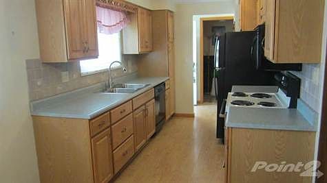 NEWER WOOD KITCHEN FLOOR