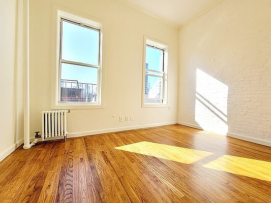 2nd image of 156 E 2nd St #14S