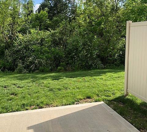 Patio overlooks trees