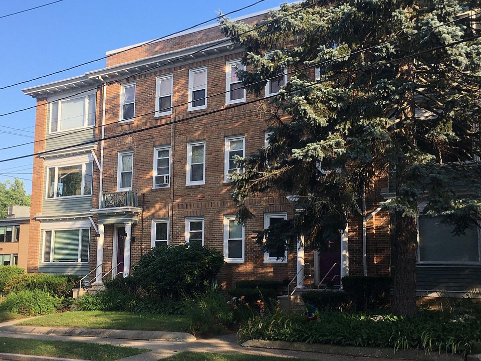 Building view from street, entrance to Unit 5 on left.