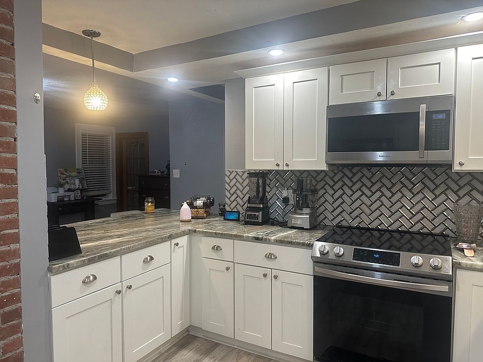 Beautiful kitchen granite kitchen and with cabinets